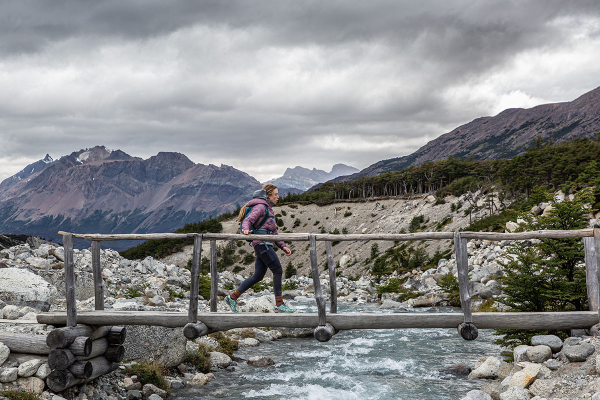 Outdoor Research SuperStrand LT Hoodie (hiking over bridge)